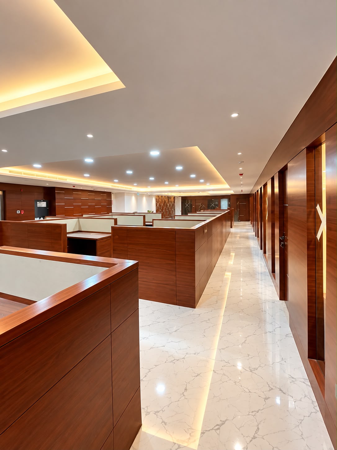 Modern corporate office workspace with wooden cubicles, elegant lighting, and premium interior finishes.